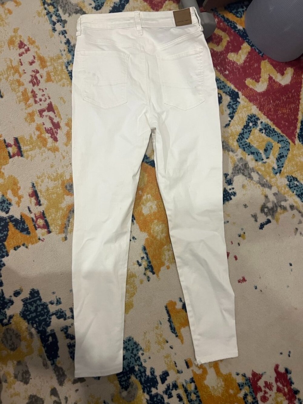 American Eagle White Super Stretch Ripped Knee Skinny Jeans - Picture 5 of 5